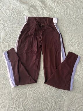 Free people movement never better joggers leggings in brown color block stripe